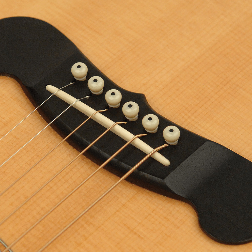 D'Addario PWPS12 Set of 7 Ivory Molded Bridge Pins with Black Dot and End Pin